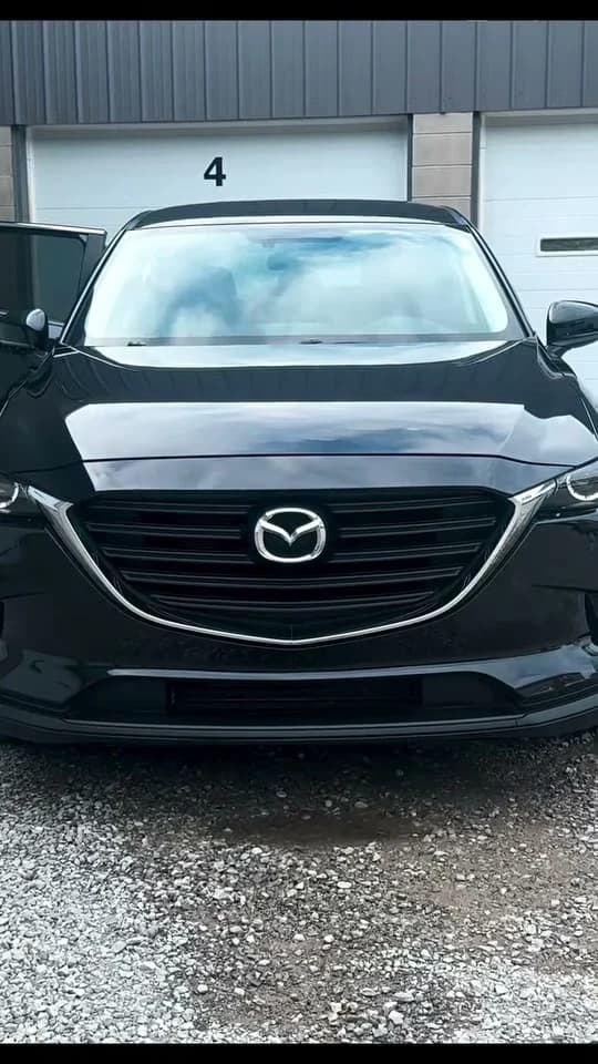 Black Mazda SUV after an exterior and interior detail by Shine Authority